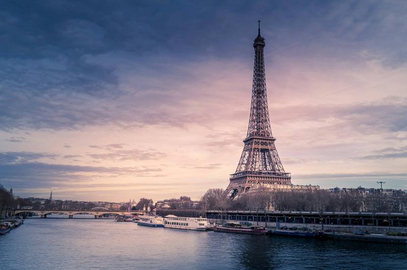 The Eiffel Tower over the Seine at sunset